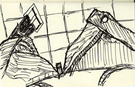 Aux toilettes, pantalon sur les chevilles